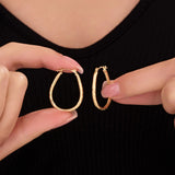 25MM Oval Sectioned Diamond Cut Hoops in 14K Gold