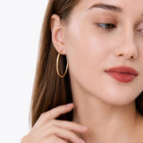 Oval Sectioned Diamond Cut and Satin Finish Hoops in 14K Gold