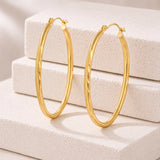 Oval Sectioned Diamond Cut and Satin Finish Hoops in 14K Gold