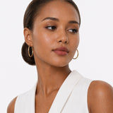 Oval Sectioned Diamond Cut and Satin Finish Hoops in 14K Gold