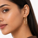 Oval Sectioned Diamond Cut and Satin Finish Hoops in 14K Gold