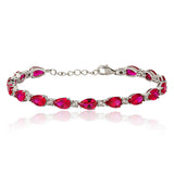 Pear Cut Ruby Tennis Bracelet with Diamonds in 925 Silver