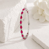 Pear Cut Ruby Tennis Bracelet with Diamonds in 925 Silver