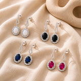 Halo Birthstone Dangle Earrings in 925 Silver