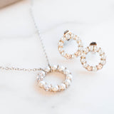 Pearl and Diamond Open Circle Studs in Silver